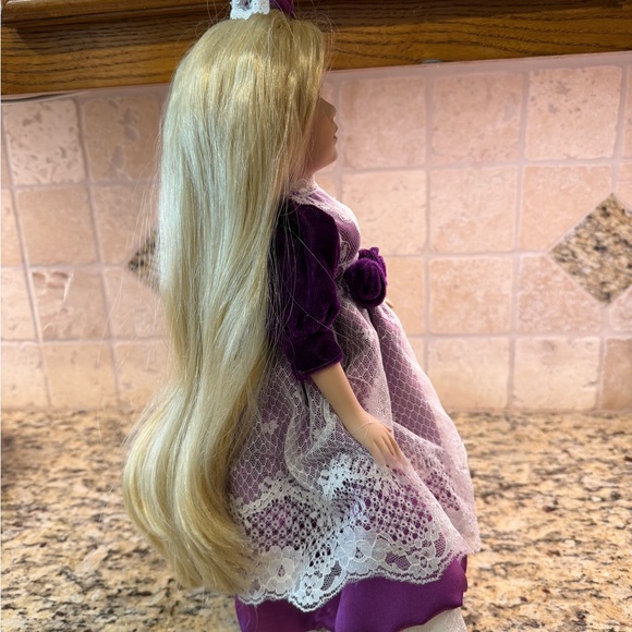 Vintage 16” Porcelain Doll with purple dress and blonde hair, blue eyes. - Picture 4 of 6